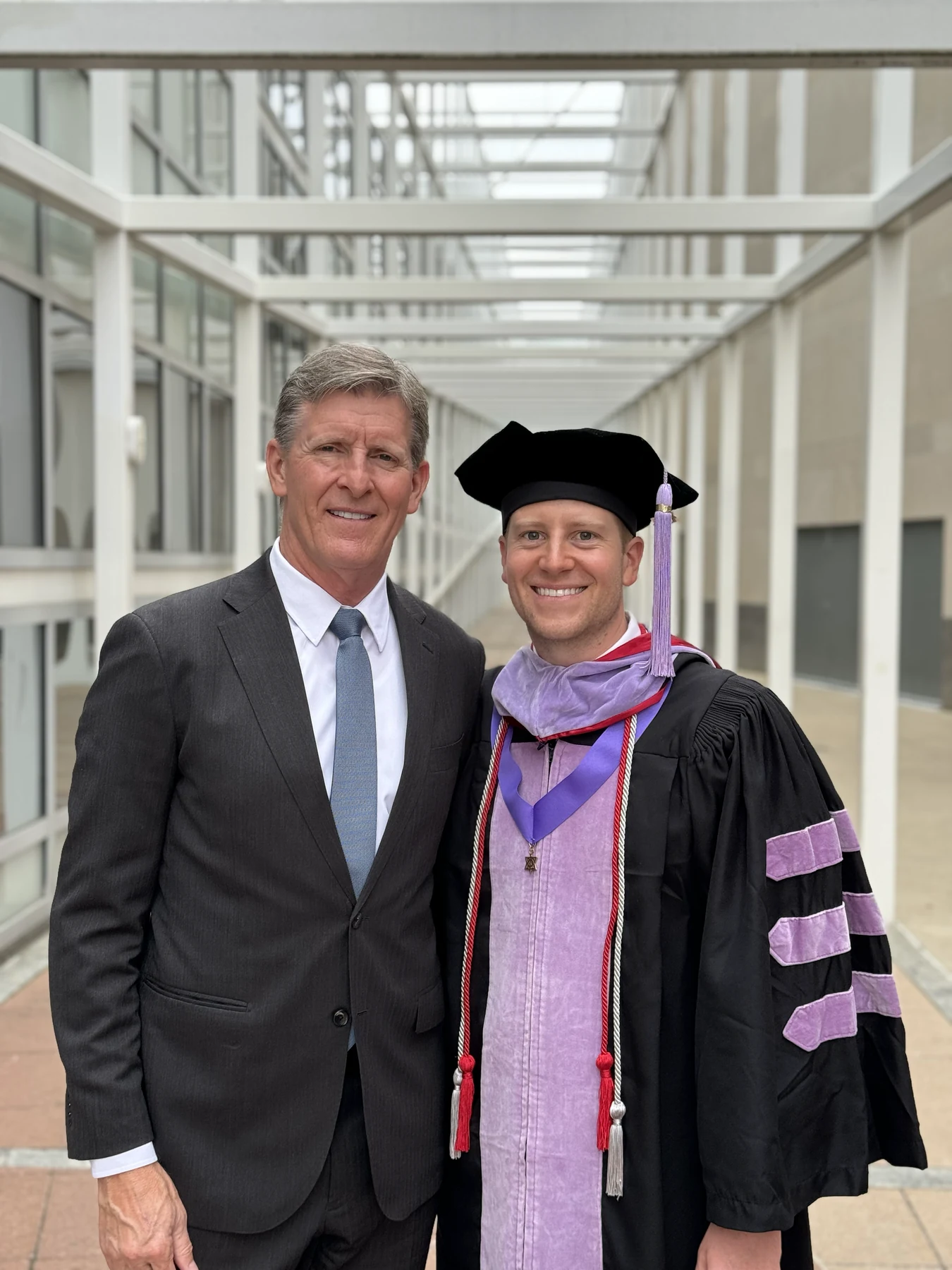 Dr. Brian Graf with Dr. Brandon Graf at his orthodontic graduation